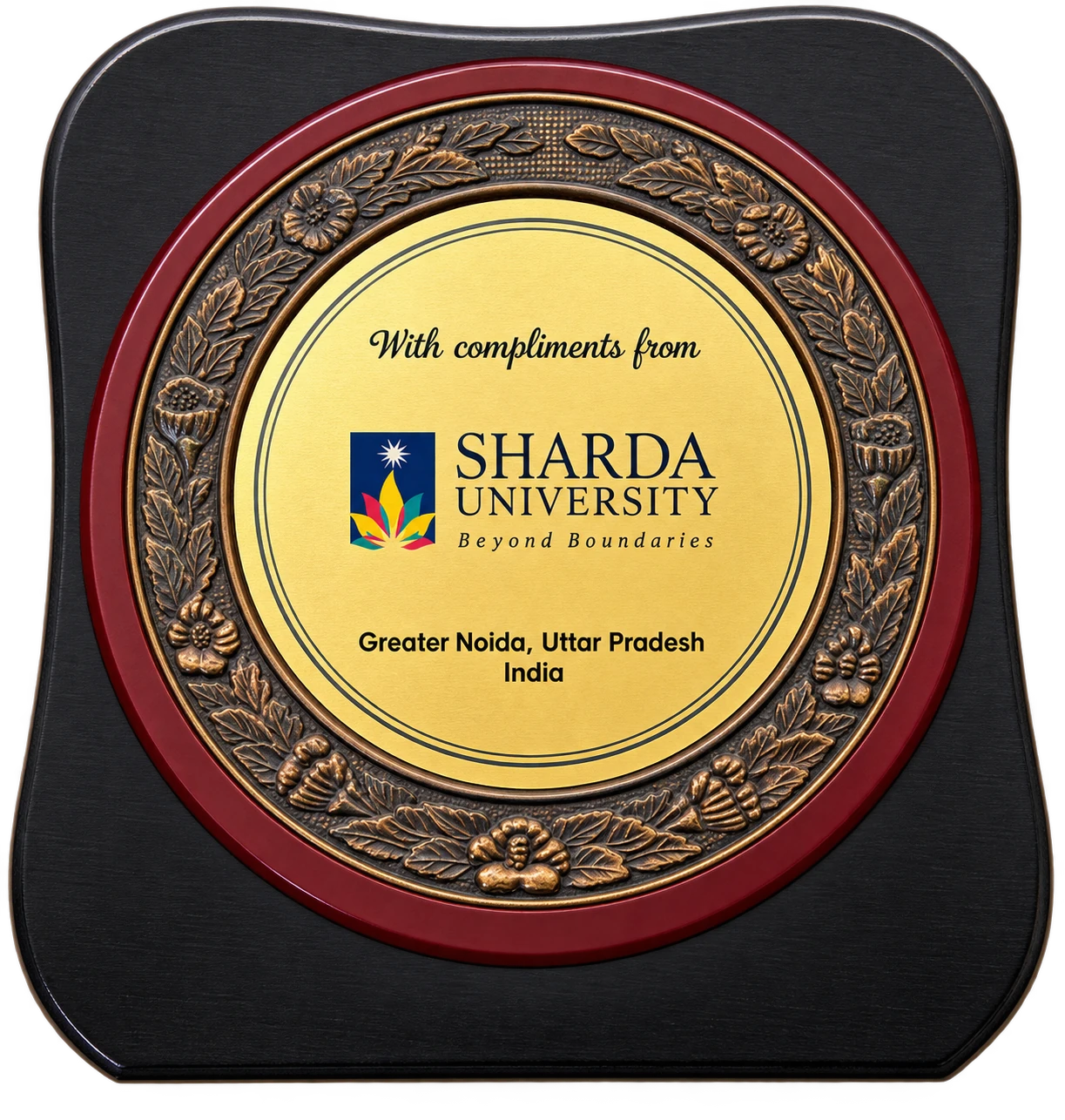 Memento plaque with compliments from Sharda University